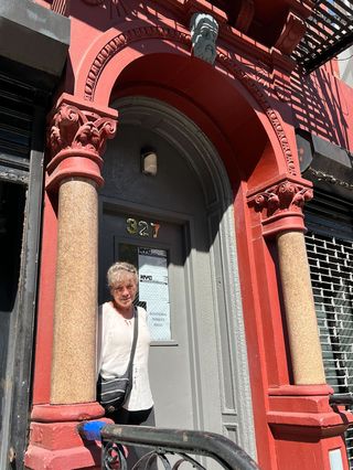 Georgina Christ, 72, in front of her East Village apartment